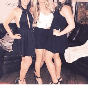 Cream crop top and black skirt